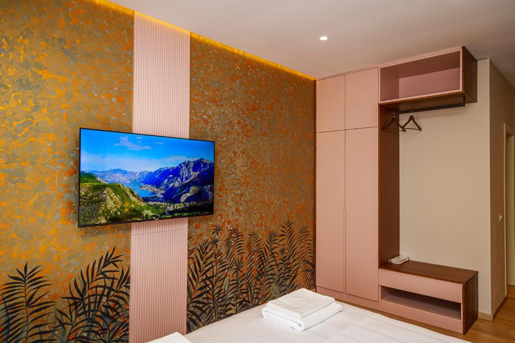 TV a/nebo společenská místnost v ubytování Solis Giselle Hotel