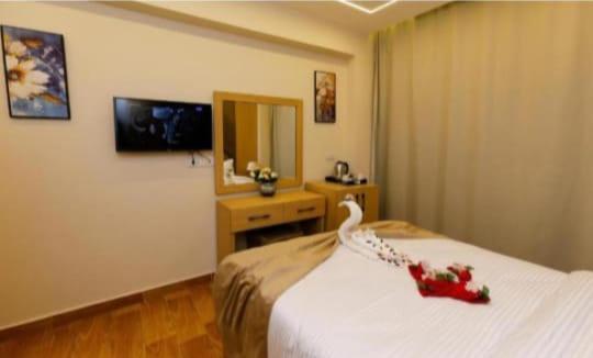 TV a/nebo společenská místnost v ubytování Amore pyramids View