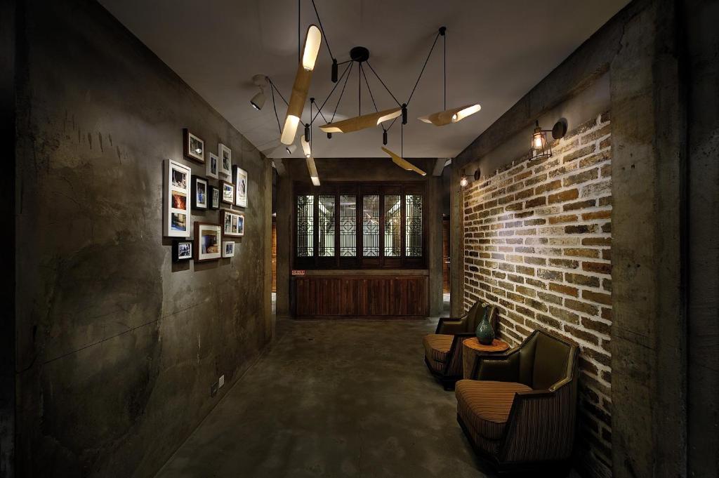 Posezení v ubytování Huangshan Shanshuijian Wei Boutique Hotel
