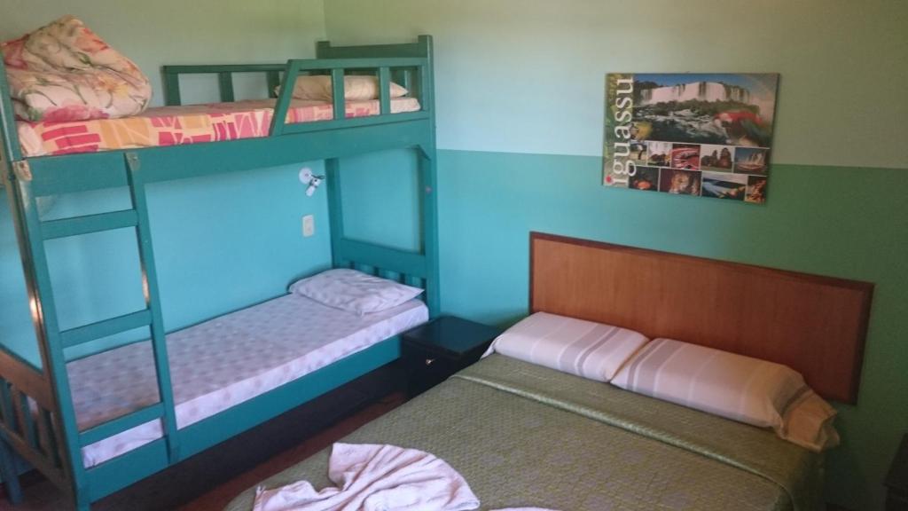 Postel nebo postele na pokoji v ubytování Hostel Iguazu Falls