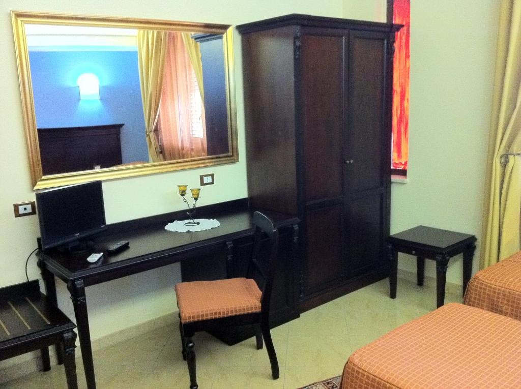 TV a/nebo společenská místnost v ubytování Sammartano Hotels