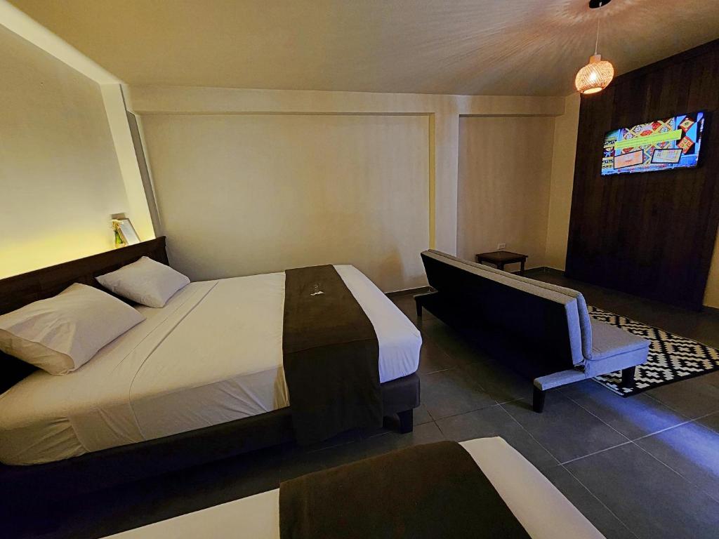 Postel nebo postele na pokoji v ubytování China Chancay Hotel