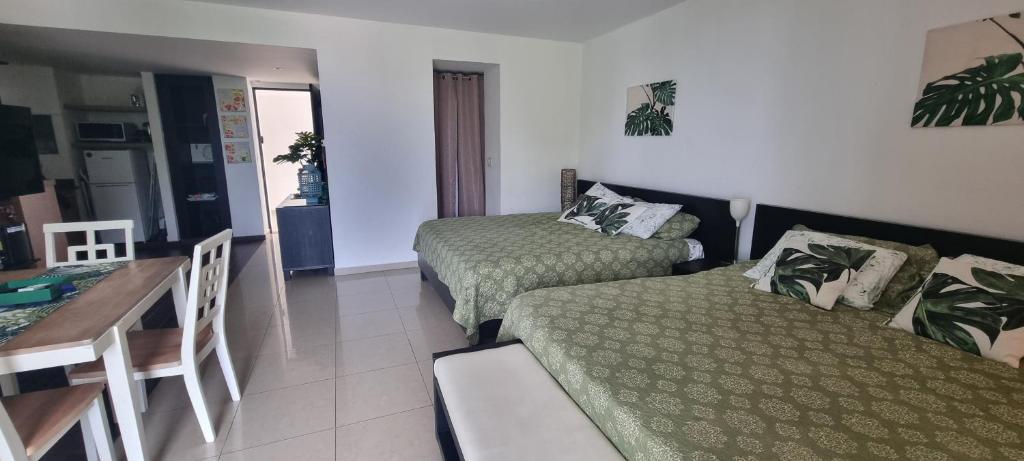 Posezení v ubytování Estudio con vista al jardìn en Town Center Playa Blanca Panama