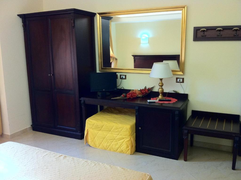 Postel nebo postele na pokoji v ubytování Sammartano Hotels