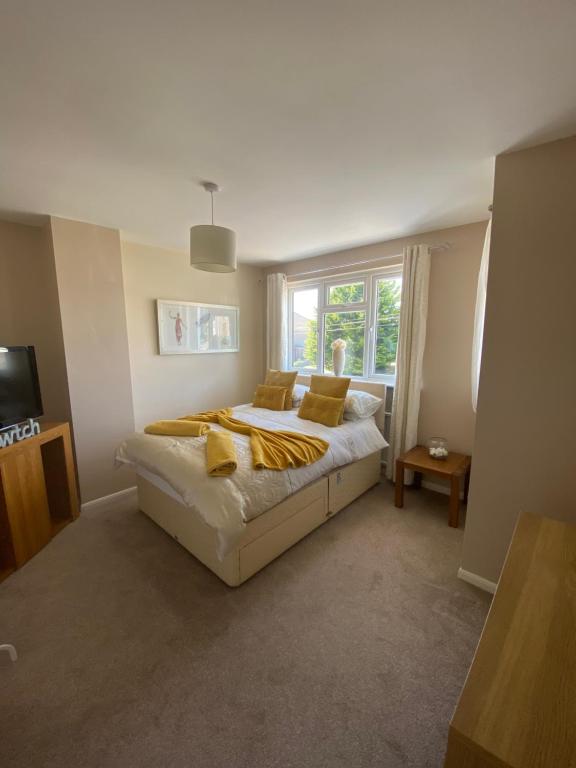 Ένα ή περισσότερα κρεβάτια σε δωμάτιο στο Rooms at Carol's Place near Porthcawl, Margam, Bridgend, 3mins to M4, 3 Room Types Available