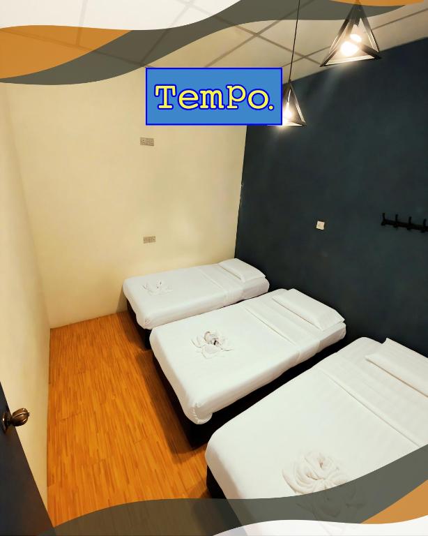 Postel nebo postele na pokoji v ubytování TEMPO