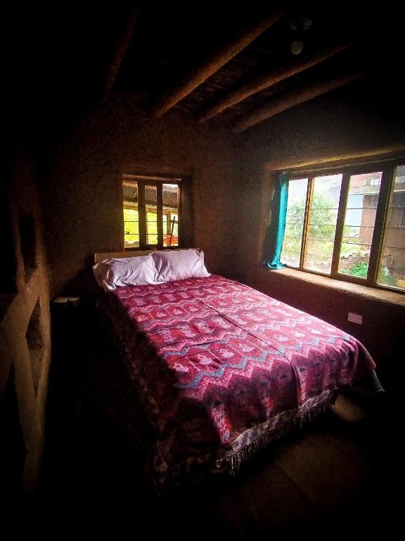Letto o letti in una camera di Sacred Valley Mystic Tribe