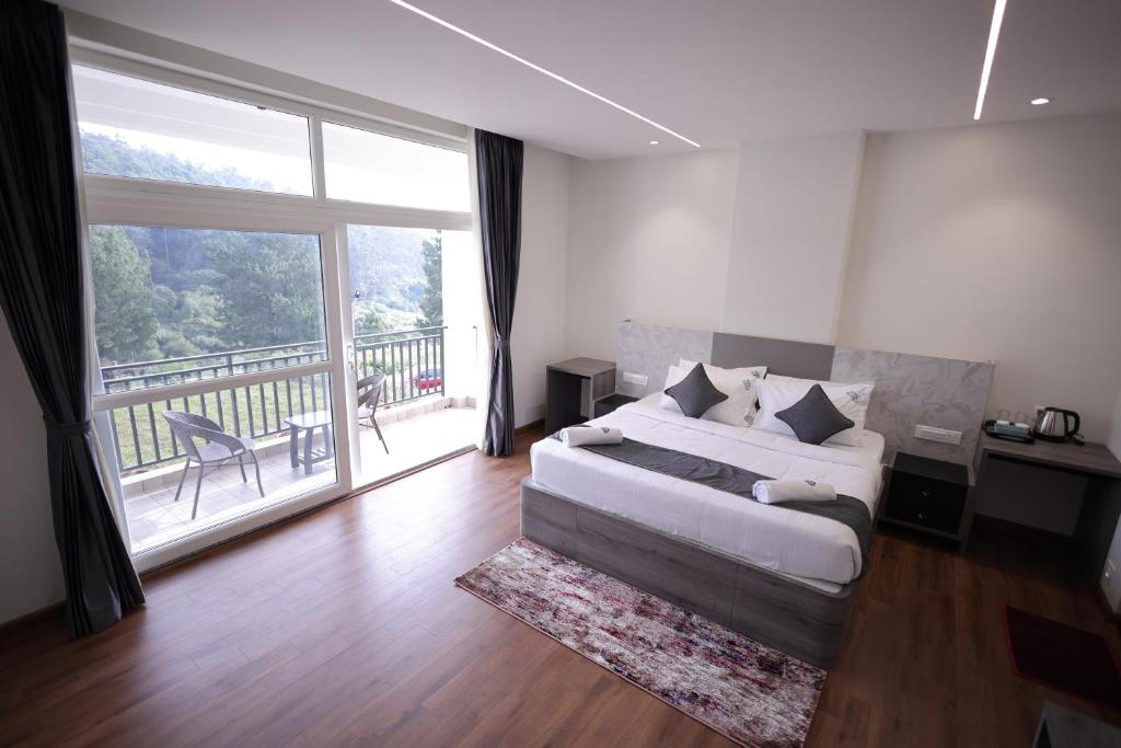 Postel nebo postele na pokoji v ubytování Vista Sunrise View Resort