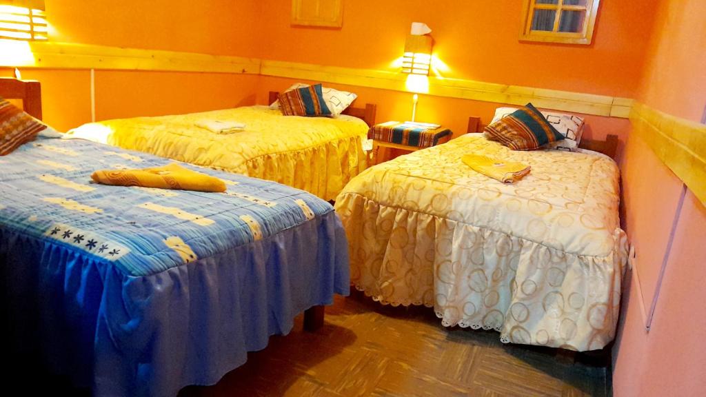 Postel nebo postele na pokoji v ubytování Jaimes Inn Hostel