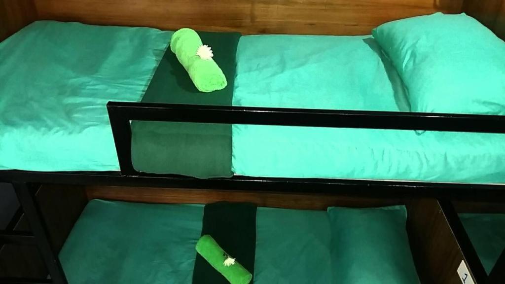 Postel nebo postele na pokoji v ubytování Czone Hostel