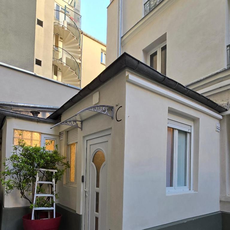 Photo de la galerie de l'établissement studio maisonnette parisien, à Paris