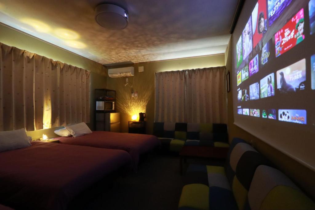 TV a/nebo společenská místnost v ubytování 月兎園