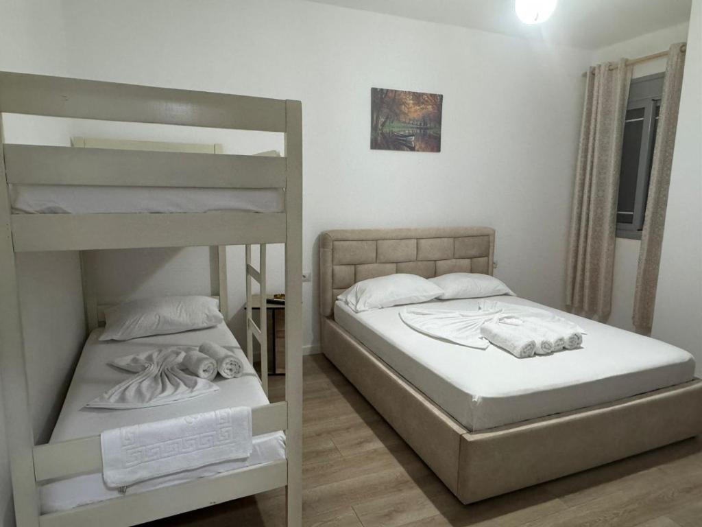 Postel nebo postele na pokoji v ubytování Vila Brilant