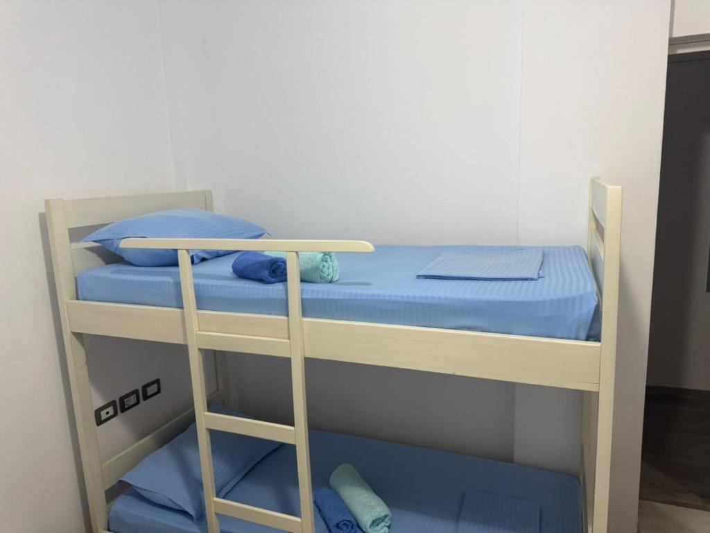 Palanda nebo palandy na pokoji v ubytování Vila Brilant