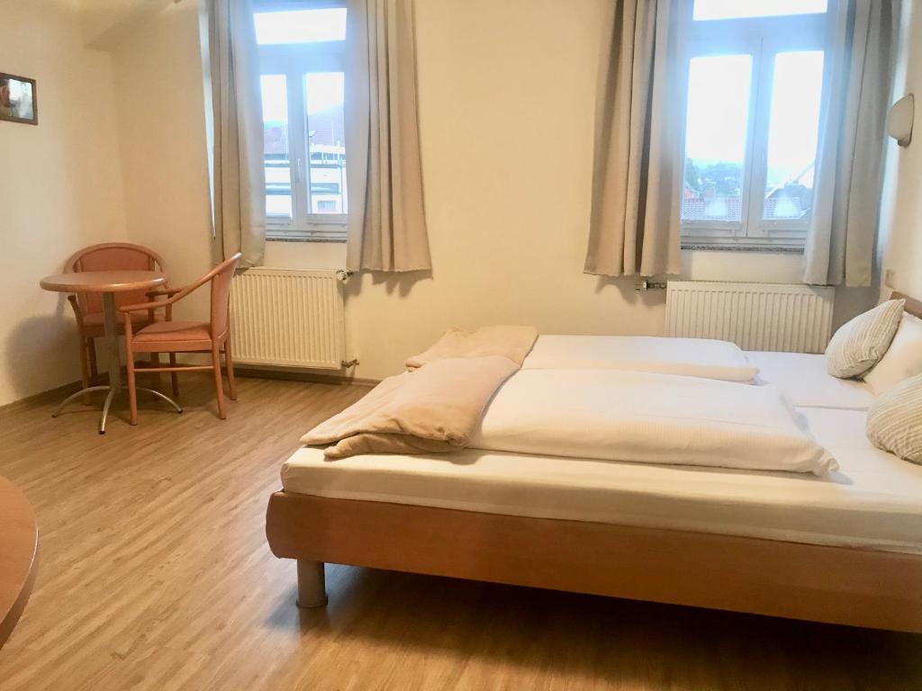 Postel nebo postele na pokoji v ubytování Ludwigs