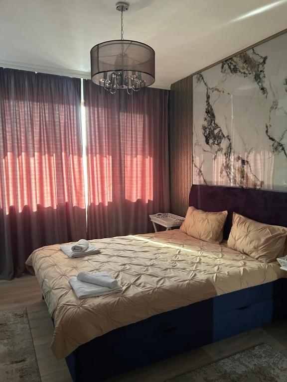 A bed or beds in a room at Didi House