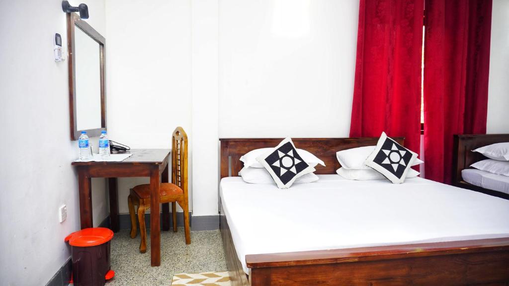 Postel nebo postele na pokoji v ubytování Jungle Edge Home Sigiriya