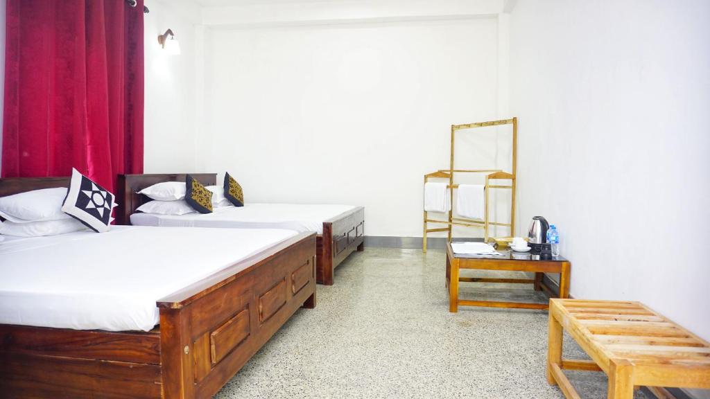 Postel nebo postele na pokoji v ubytování Jungle Edge Home Sigiriya