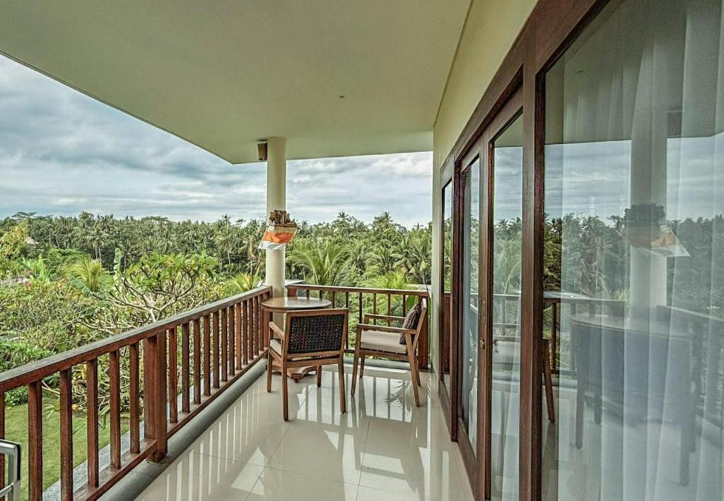 Balkón nebo terasa v ubytování DLobong Suites Ubud