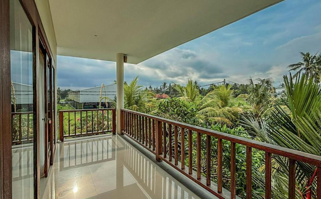 Balkón nebo terasa v ubytování DLobong Suites Ubud