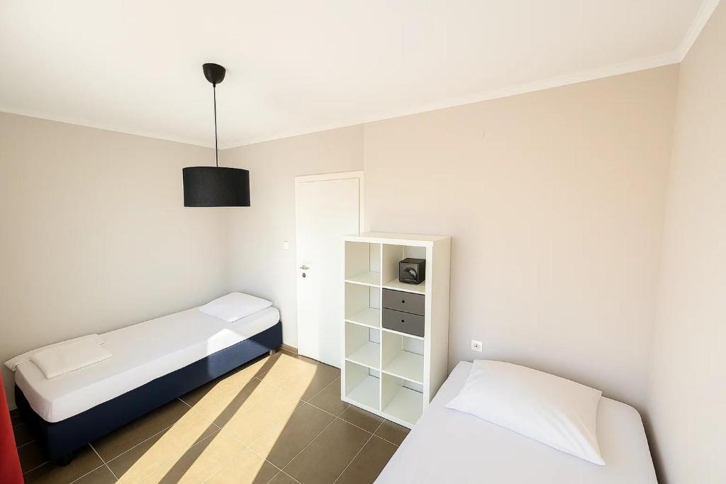Postel nebo postele na pokoji v ubytování Million Star Villa