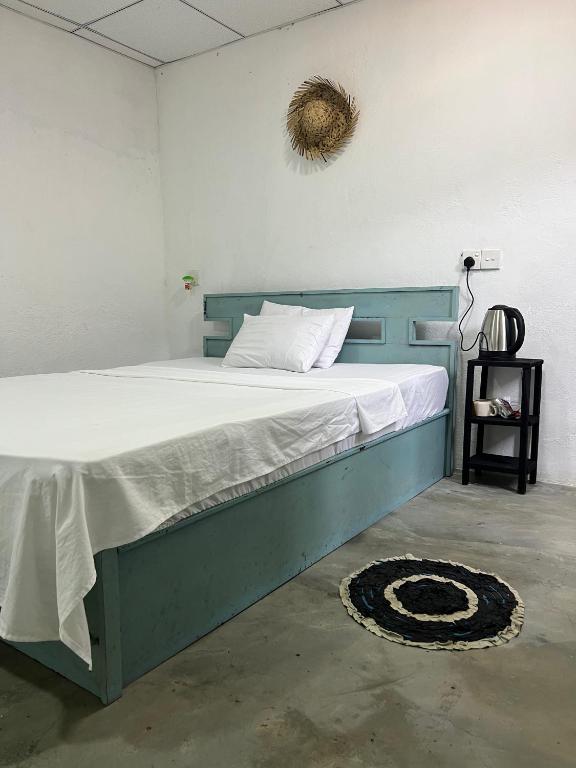 Postel nebo postele na pokoji v ubytování Cactus Arugambay
