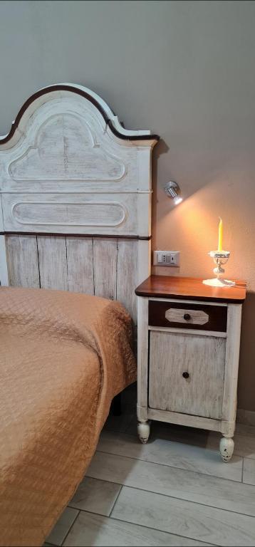 Postel nebo postele na pokoji v ubytování Quarantotto B&B