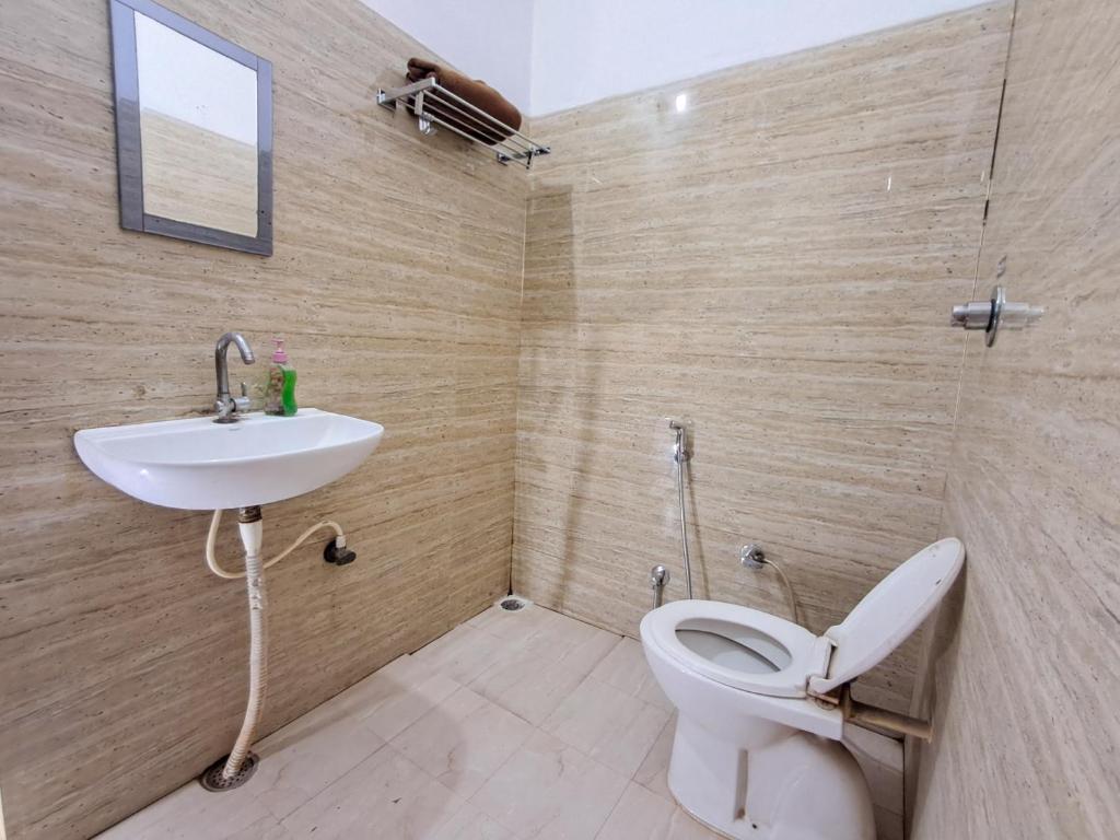 Koupelna v ubytování LD Guest House, Ayodhya