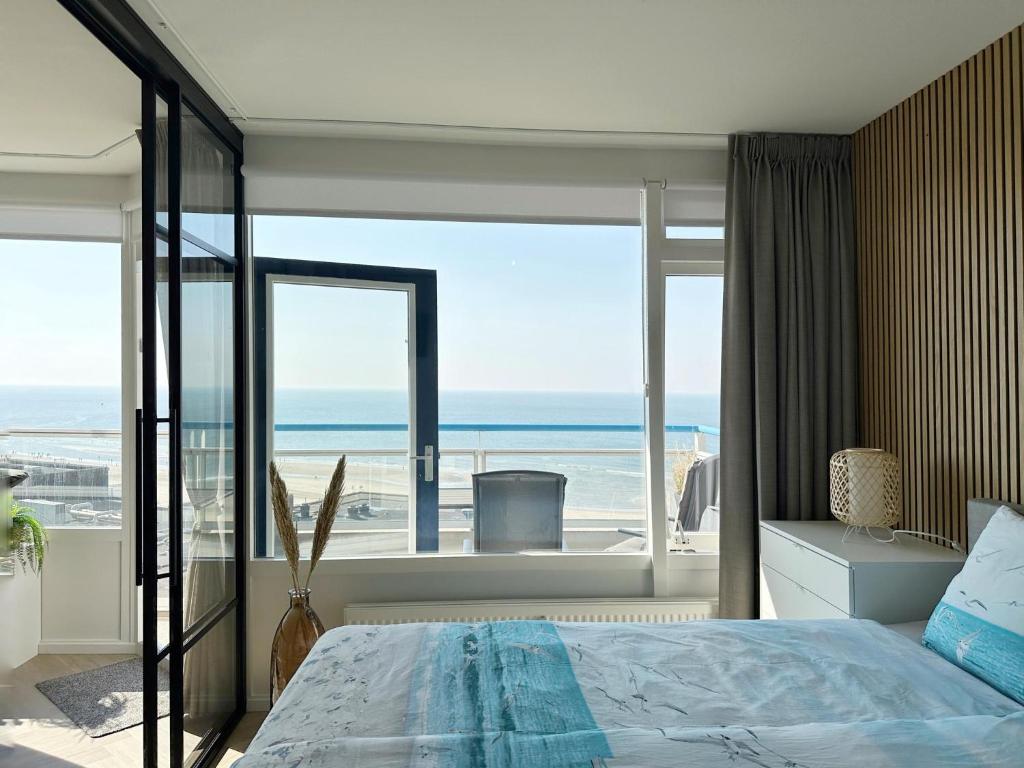 Ένα ή περισσότερα κρεβάτια σε δωμάτιο στο Sterflat aan Zee