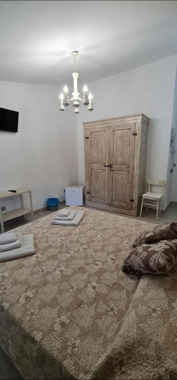 Postel nebo postele na pokoji v ubytování Quarantotto B&B