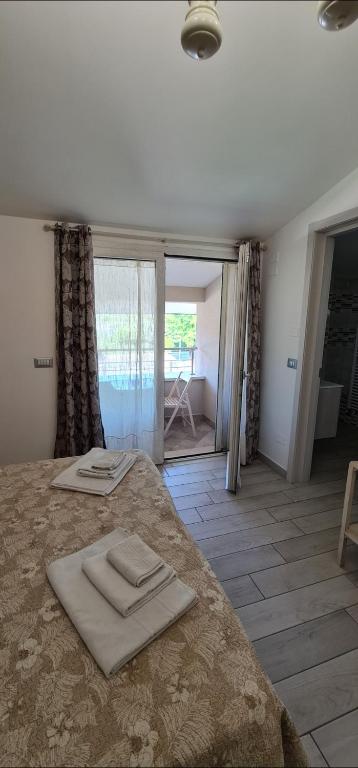 Postel nebo postele na pokoji v ubytování Quarantotto B&B