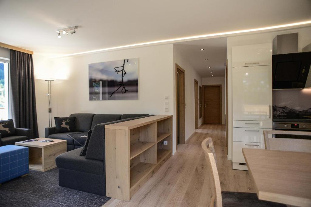 TV a/nebo společenská místnost v ubytování R Appartements Sommerbergbahnen inklusive