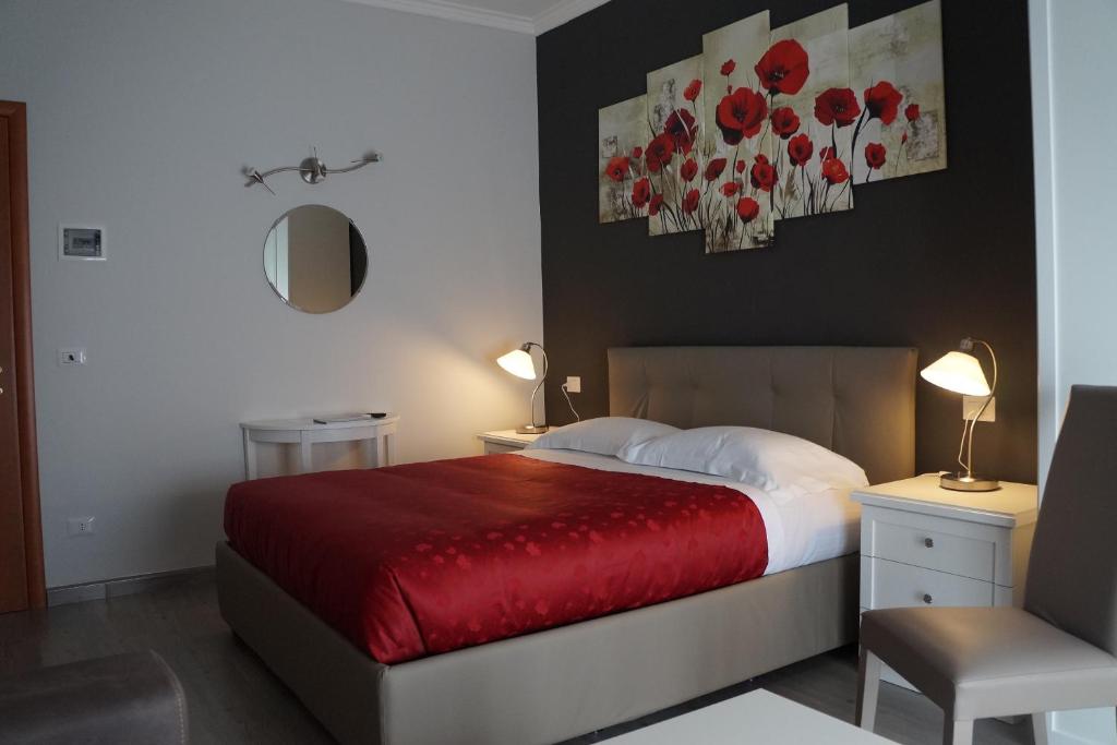Postel nebo postele na pokoji v ubytování B&B Peschici 4 Stagioni