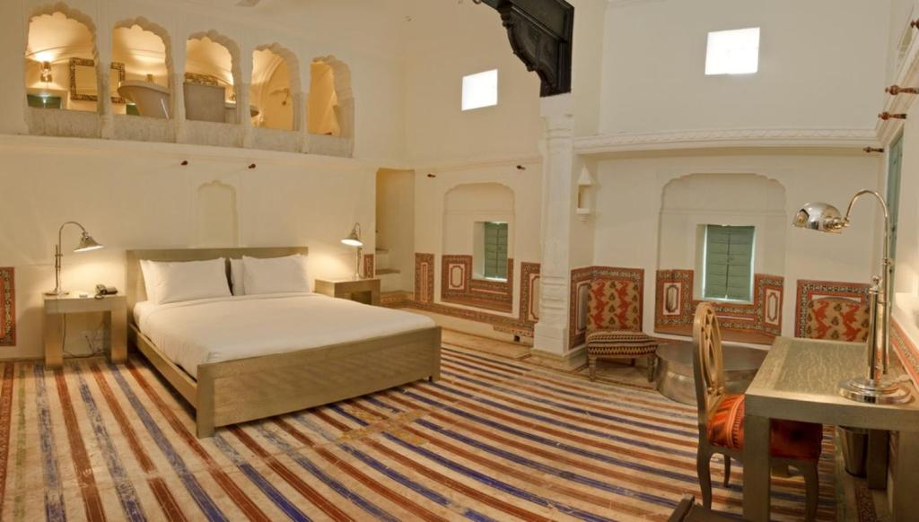 Letto o letti in una camera di Vivaana Culture Hotel