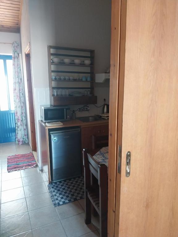 Kuchyň nebo kuchyňský kout v ubytování Ilios Kalamaki