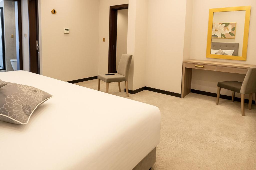 Letto o letti in una camera di Saraya Palace Hotel
