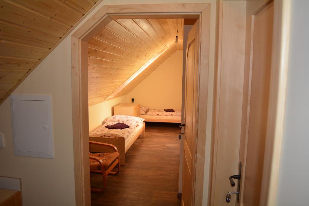 Postel nebo postele na pokoji v ubytování Penzion Sklep Sv. Urbana