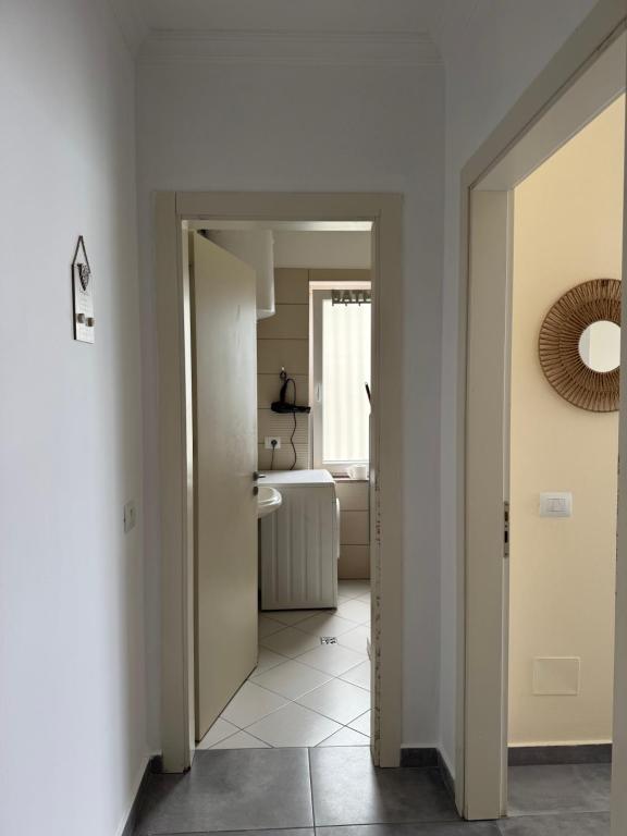 Postel nebo postele na pokoji v ubytování Deluxe Apartments Shengjin