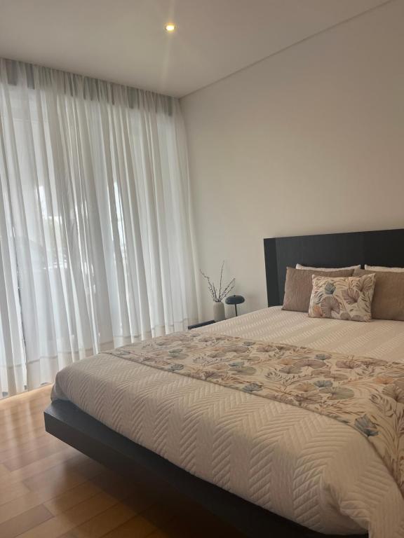 Postel nebo postele na pokoji v ubytování Crystal House