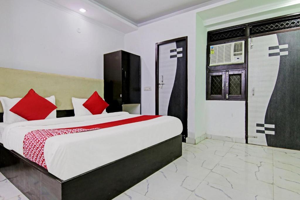 Postel nebo postele na pokoji v ubytování Hotel O Downtown
