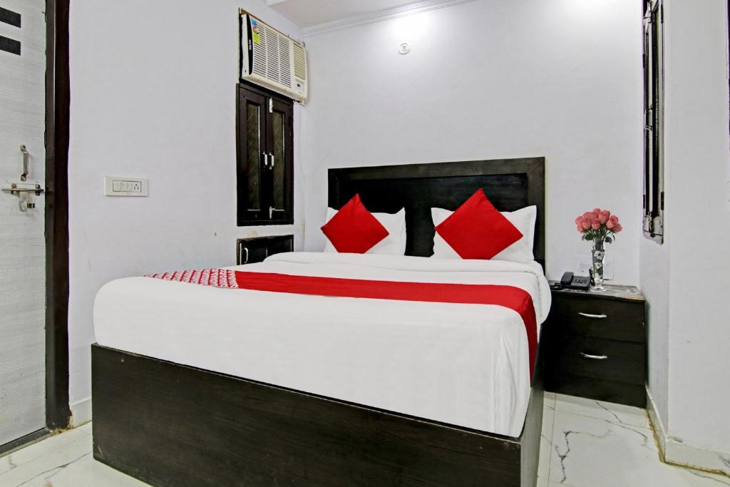 Postel nebo postele na pokoji v ubytování Hotel O Downtown