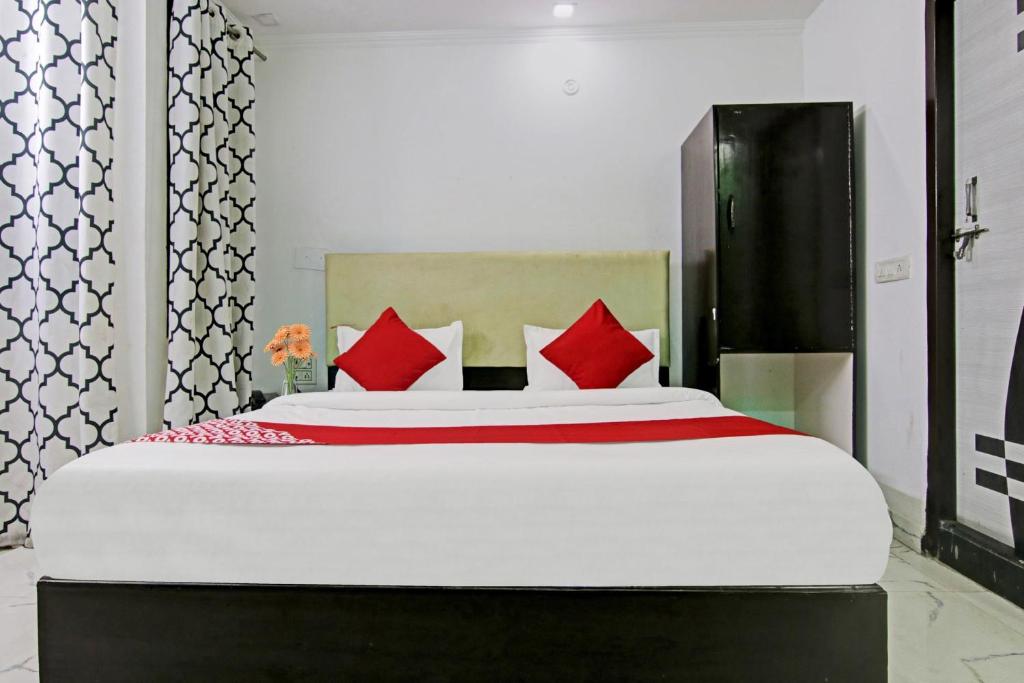 Postel nebo postele na pokoji v ubytování Hotel O Downtown