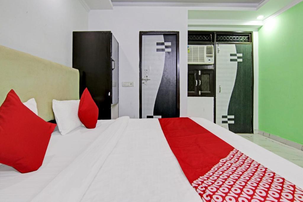 Postel nebo postele na pokoji v ubytování Hotel O Downtown