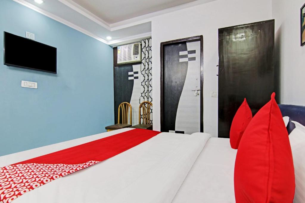 Postel nebo postele na pokoji v ubytování Hotel O Downtown