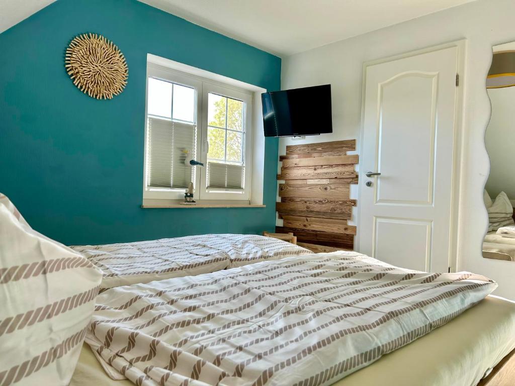 Postel nebo postele na pokoji v ubytování Ferienhaus Biedermann