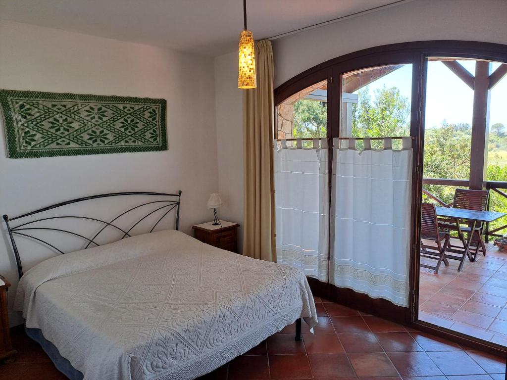 Postel nebo postele na pokoji v ubytování B&B Castiglias