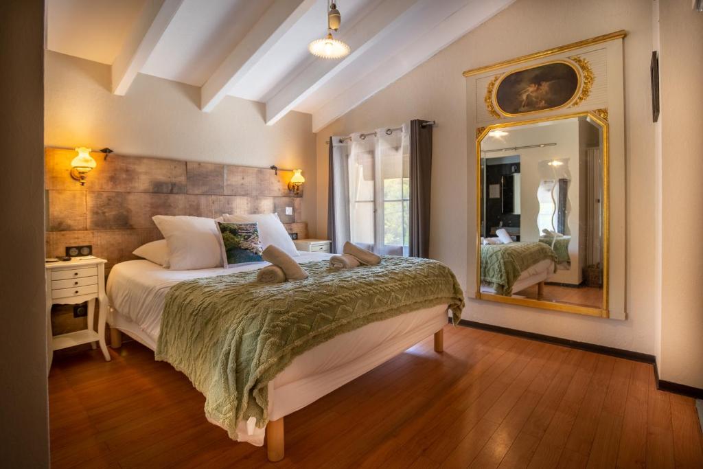 Postel nebo postele na pokoji v ubytování Auberge U Mulinu
