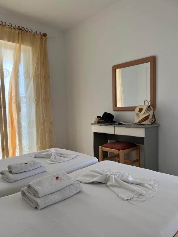 Posteľ alebo postele v izbe v ubytovaní Manine Apartments