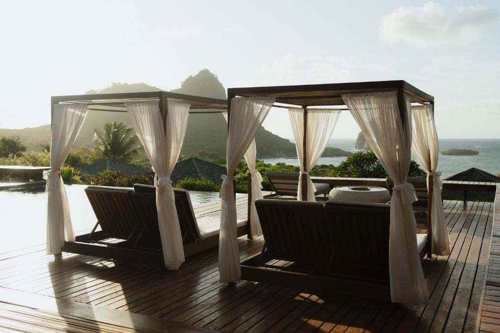 a gazebo on the deck of a resort at Pousada Maravilha in Fernando de Noronha