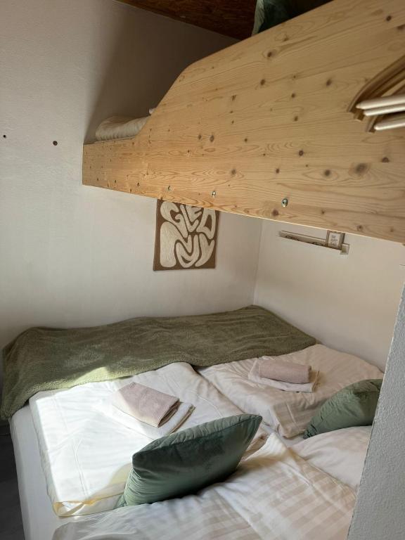 Postel nebo postele na pokoji v ubytování Tiny Home Kontík
